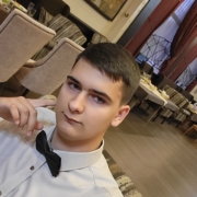 Роман Мельников